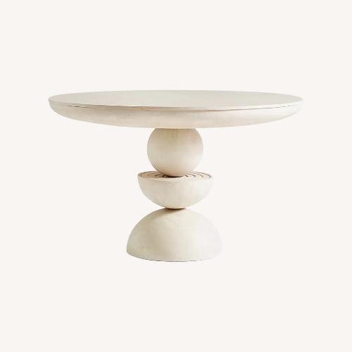 Used Anthropologie Sonali White Wood Dining Table for sale on AptDeco