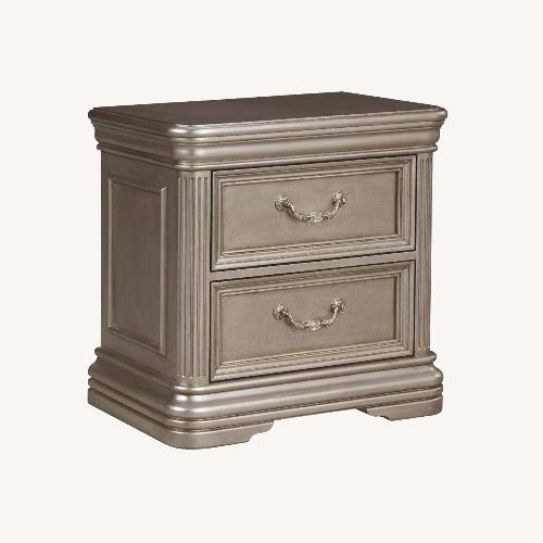 Used Ashley Furniture Birlany Silver Wood Nightstand for sale on AptDeco