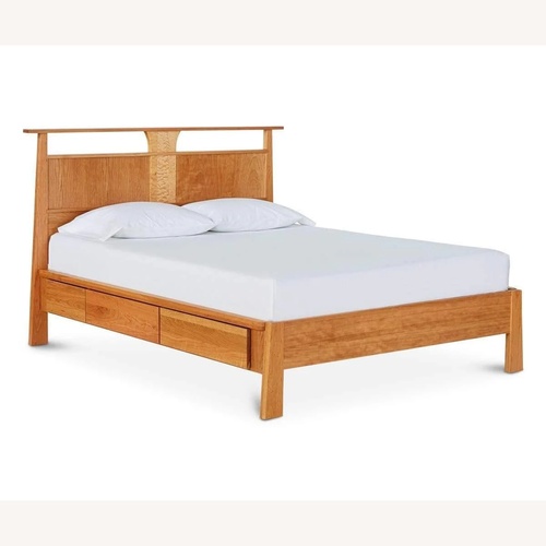 Used Scandinavian Designs Natural Wood Queen Bed for sale on AptDeco