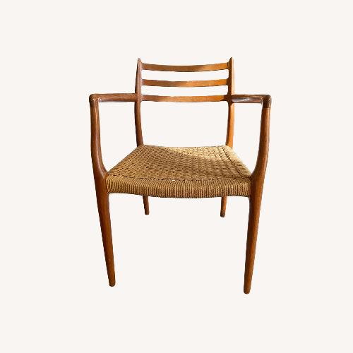 Used Light Brown Wood Armchair for sale on AptDeco