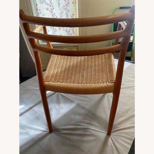 Used Light Brown Wood Armchair for sale on AptDeco