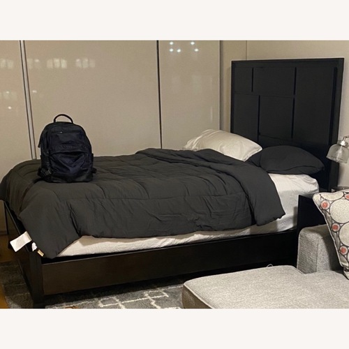 Used Raymour & Flanigan Dark Brown Queen Platform Bed for sale on AptDeco