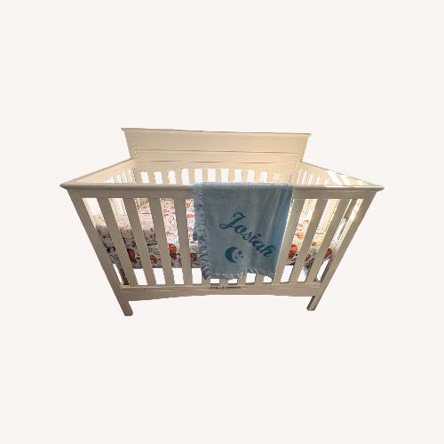 Used Deltana White Wood Crib for sale on AptDeco