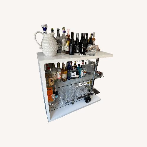 Used Home Goods White Modern Glass and Chrome Bar Cart for sale on AptDeco