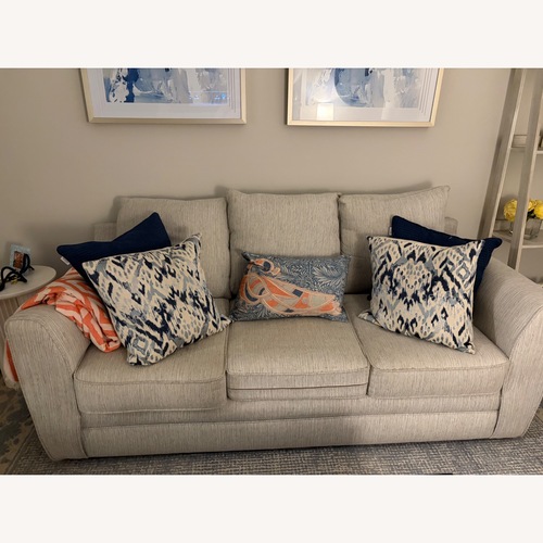 Used Rooms To Go  Light Gray Fabric 2 Seater Sofa for sale on AptDeco