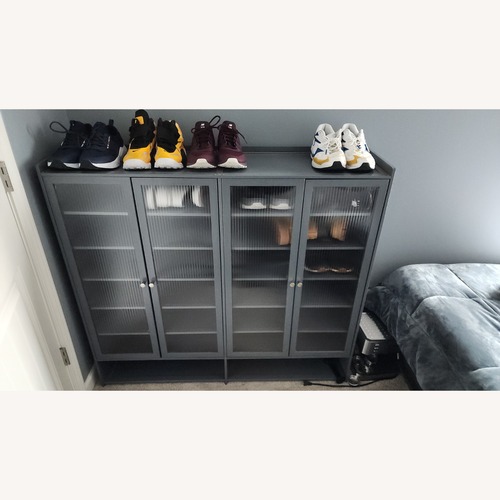 Used 8 Tier Bamboo Show Cabinet for sale on AptDeco