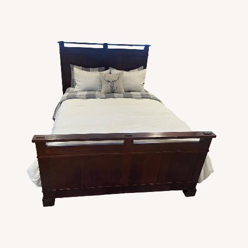 Used Crate & Barrel Dark Brown Wood Queen Bed for sale on AptDeco