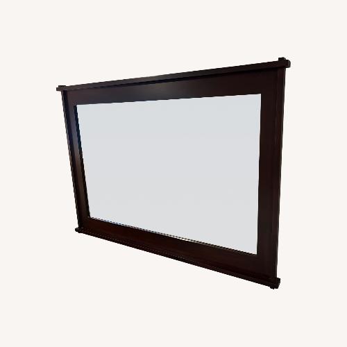 Used Crate & Barrel Dark Brown Wood Wall Mirror for sale on AptDeco