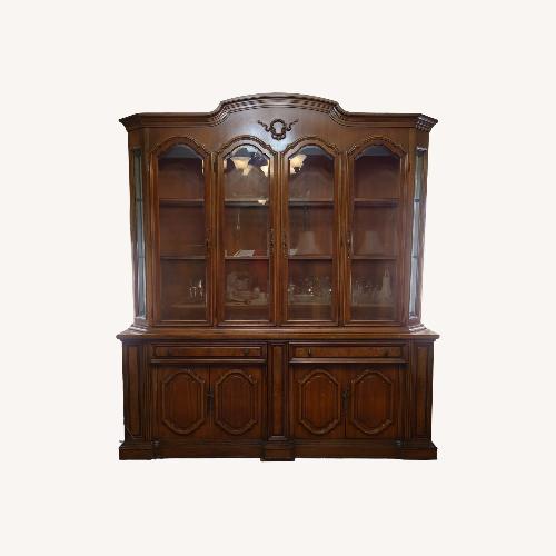 Used Walnut Lighted Breakfront China Cabinet for sale on AptDeco