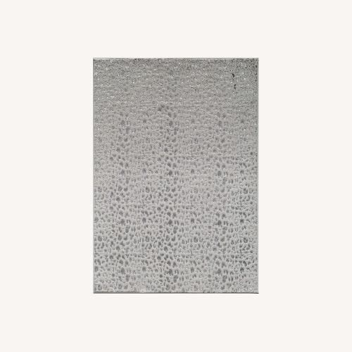 Used Snow Leopard Contemporary Rug 5' x 8' for sale on AptDeco