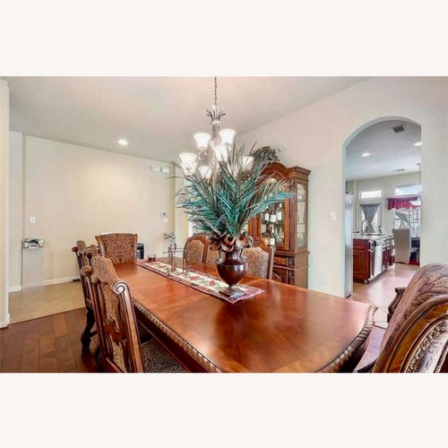 Used Vintage Victorian Dark Wood Dining Table Set for sale on AptDeco