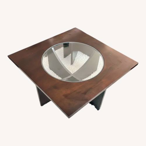 Used Living Spaces Dark Brown Wood Coffee Table for sale on AptDeco