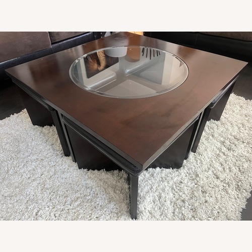 Used Living Spaces Dark Brown Wood Coffee Table for sale on AptDeco