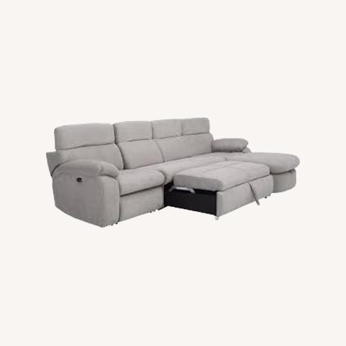 Used Raymour & Flanigan Light Gray 3+ Piece Sectional for sale on AptDeco