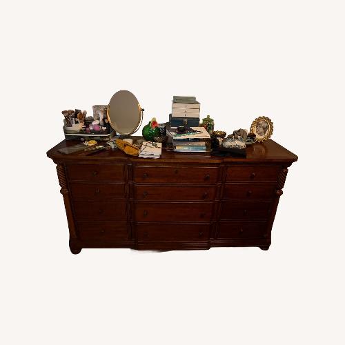 Used Vintage/Antique Dark Brown Wood Dresser for sale on AptDeco