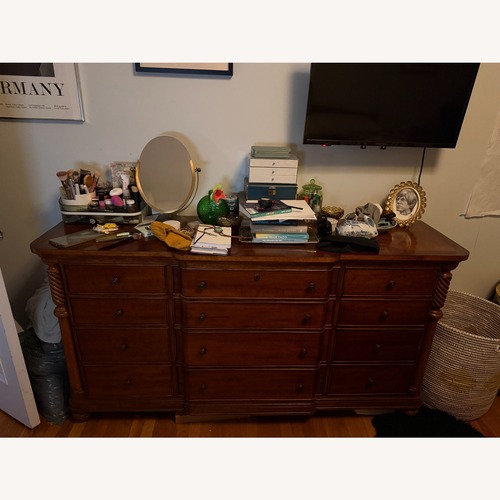 Used Vintage/Antique Dark Brown Wood Dresser for sale on AptDeco