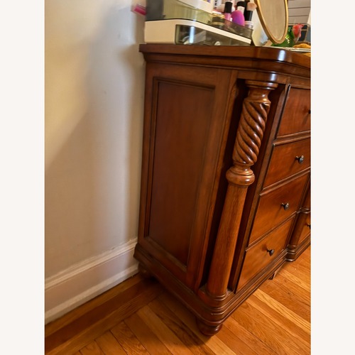 Used Vintage/Antique Dark Brown Wood Dresser for sale on AptDeco