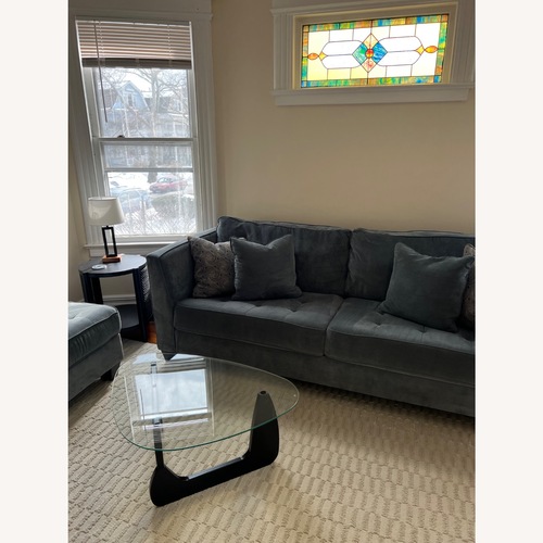 Used Ashley Furniture Blue 2 Piece Couch and Chaise for sale on AptDeco