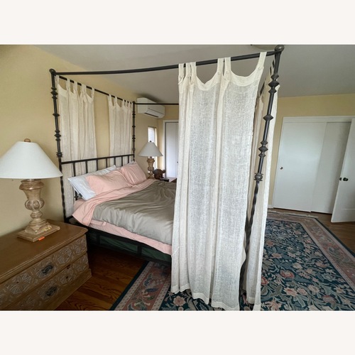 Used Kreiss Black Iron Queen Bed for sale on AptDeco