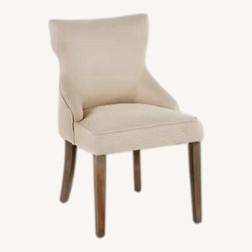 Used World Market Natural Landon Upholstered Dining Chair for sale on AptDeco