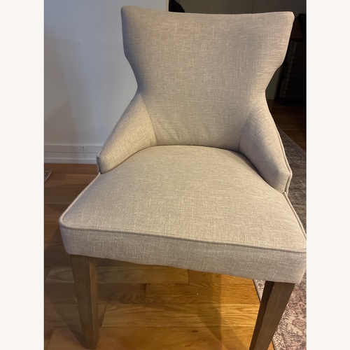 Used World Market Natural Landon Upholstered Dining Chair for sale on AptDeco
