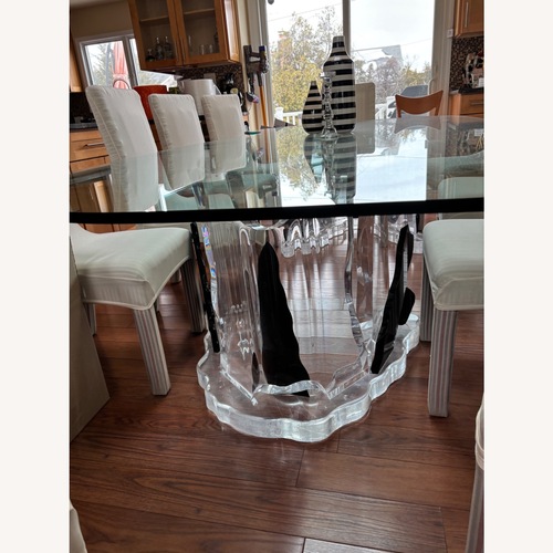 Used Transparent Glass Dining Table for sale on AptDeco