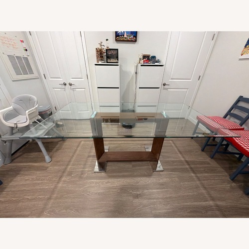 Used Light Brown Glass Dining Table for sale on AptDeco