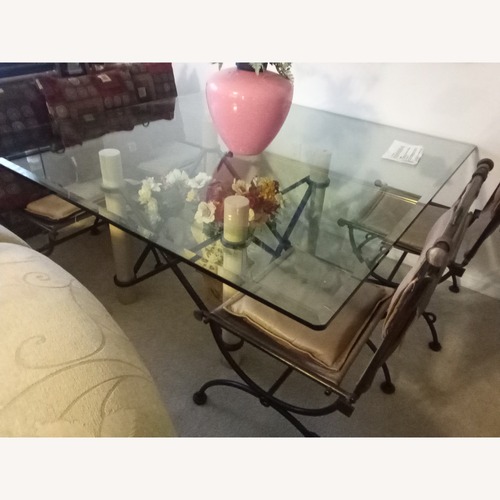 Used Dark Gray Metal Dining Table for sale on AptDeco