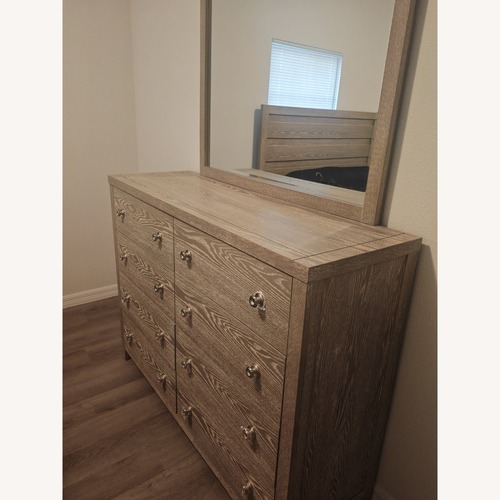 Used Rooms To Go Barrigner Place Light Gray Dresser for sale on AptDeco