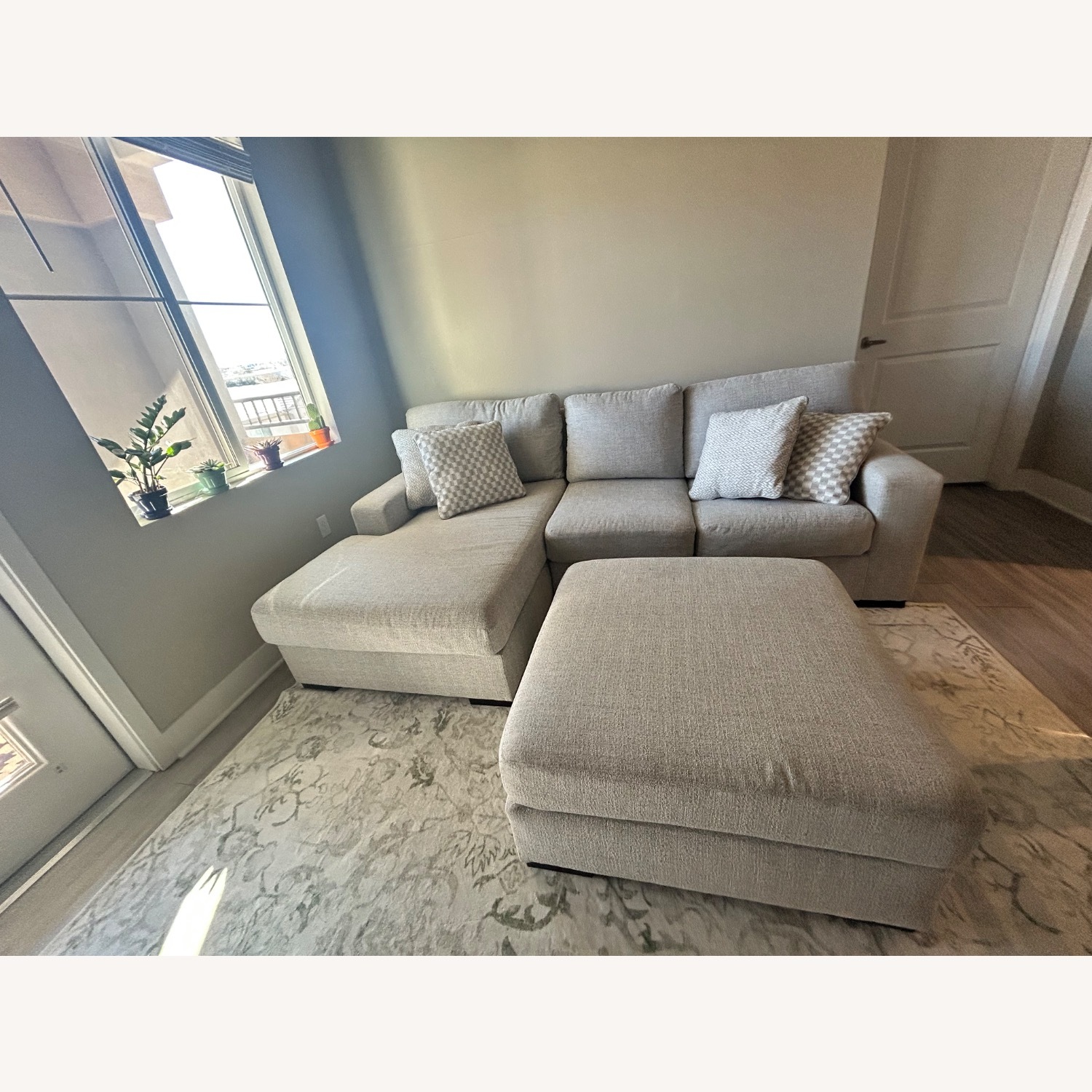 Ashley Furniture Larce 2-Piece Next-Gen Nuvella™ Performance Fabric Sofa Chaise - image-1