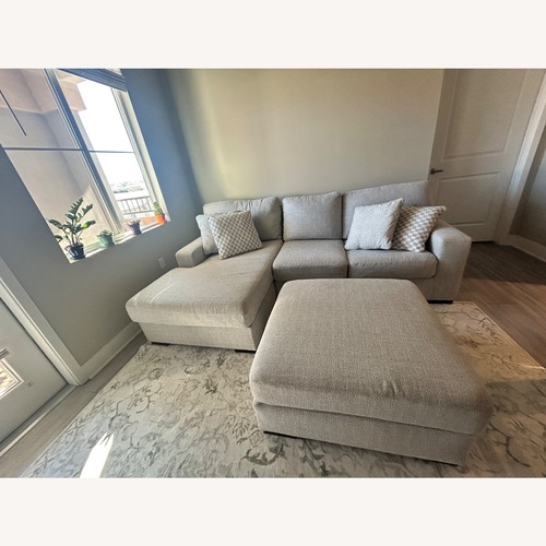 Used Ashley Furniture Larce 2-Piece Next-Gen Nuvella™ Performance Fabric Sofa Chaise for sale on AptDeco