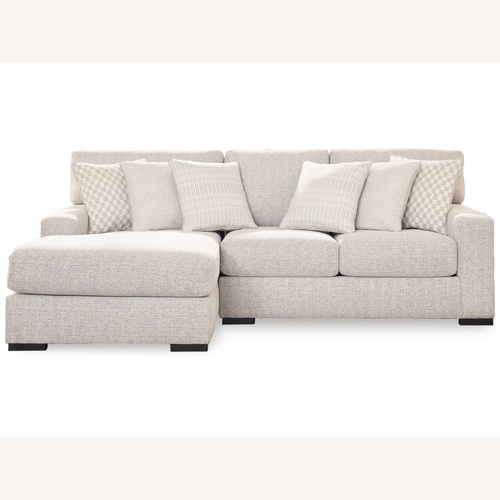 Used Ashley Furniture Larce 2-Piece Next-Gen Nuvella™ Performance Fabric Sofa Chaise for sale on AptDeco