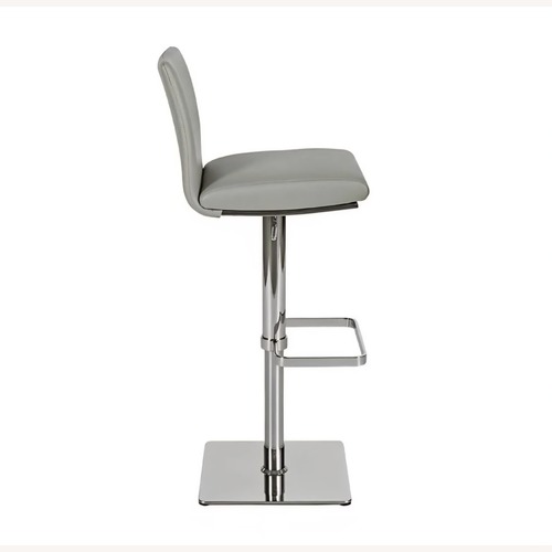 Used Scandinavian Designs White Faux Leather Stools for sale on AptDeco