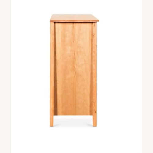 Used Scandinavian Designs Wood Castle Natural Wood Dresser for sale on AptDeco