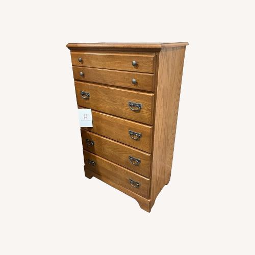 Used Carolina Creek Autumn Oak 5-Drawer Dresser for sale on AptDeco