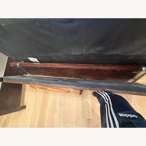 Used Dark Brown Leather King Bed Frame for sale on AptDeco