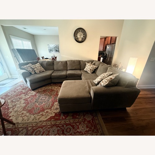 Used Rooms To Go Light Brown Chaise Lounge for sale on AptDeco