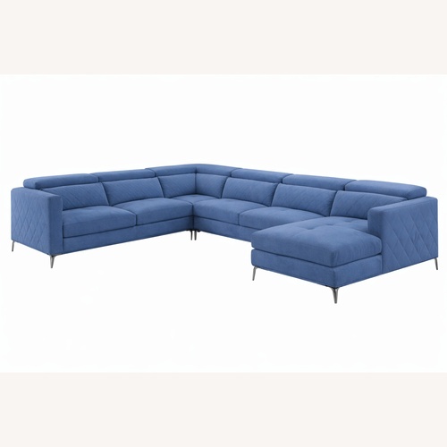Used Sofia Vergara Blue Sectional Sofa for sale on AptDeco