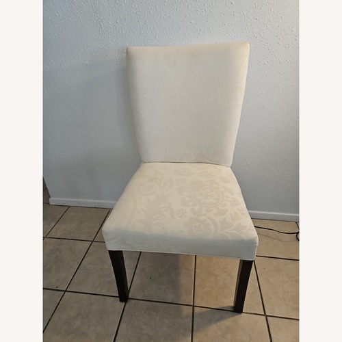 Used Rooms To Go White Fabric Accent Chair for sale on AptDeco