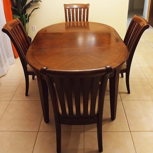Used Extendable Table + 4 Cushioned Chairs for sale on AptDeco