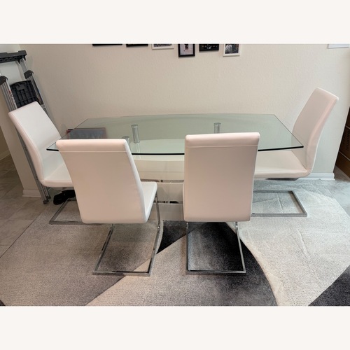 Used White Glass Dining Table 4 Chairs for sale on AptDeco