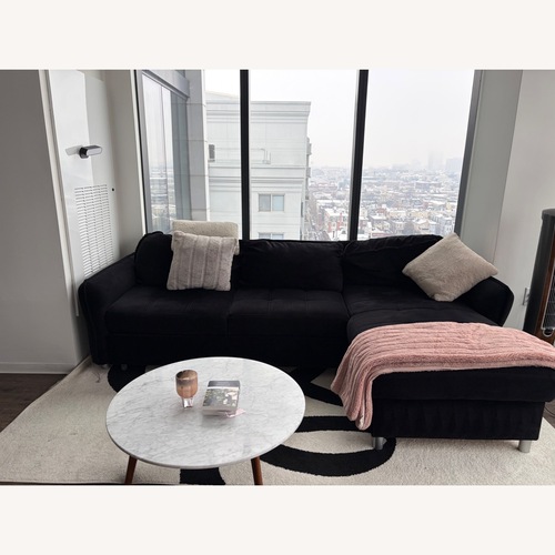 Used Black Sectional Sleeper Sofa for sale on AptDeco