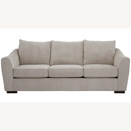 Used Raymour & Flanigan Tatum Sand Colored Fabric Sofa for sale on AptDeco