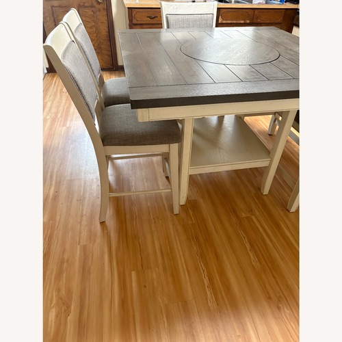 Used Ashley Furniture Light Gray Wood Dining Set for sale on AptDeco