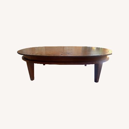 Used Tomlinson Vintage Oval Coffee Table  for sale on AptDeco