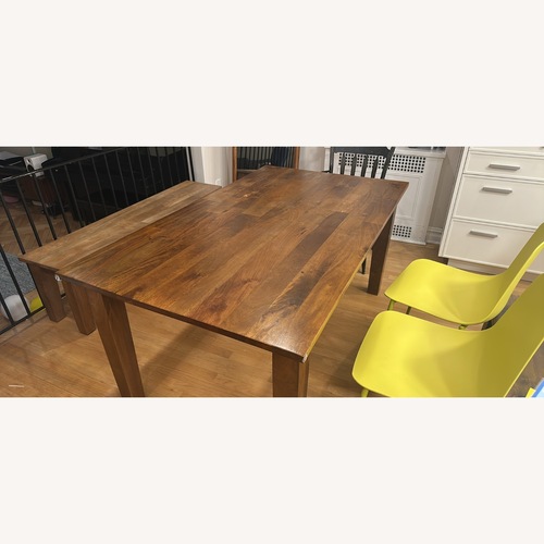 Used Crate & Barrel Dark Brown Wood Dining Table for sale on AptDeco