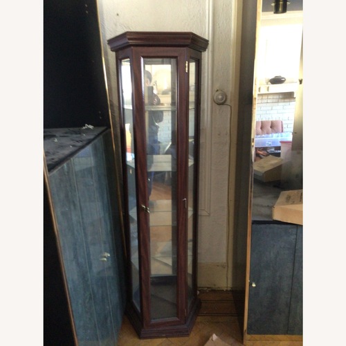 Used Vintage/Antique Dark Brown Wood Wall Unit for sale on AptDeco