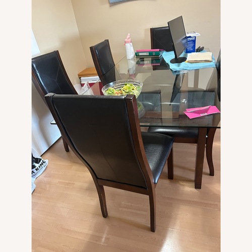Used Dining Table with 6 chairs for sale on AptDeco