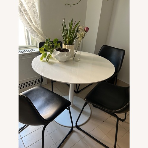 Used Living Spaces Cobbler Black Faux Leather Dining Chairs for sale on AptDeco