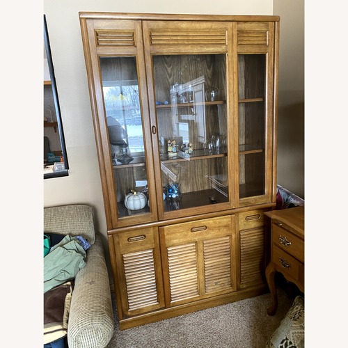 Used Vintage/Antique Light Brown Wood Armoire for sale on AptDeco
